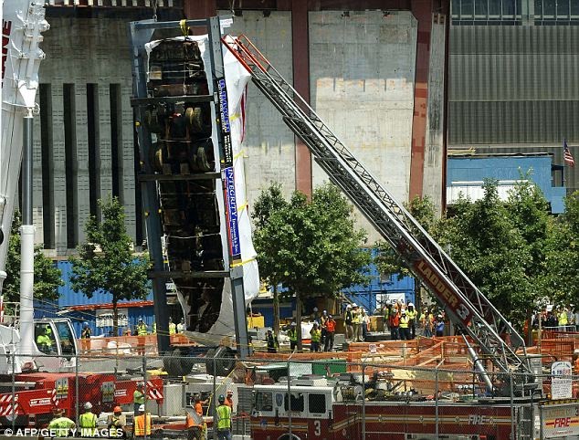 The current Ladder Company 3 fire truck, seen in front, escorted the 9/11 truck to the ceremony