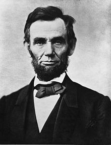 Iconic black and white photograph of Lincoln showing his head and shoulders.